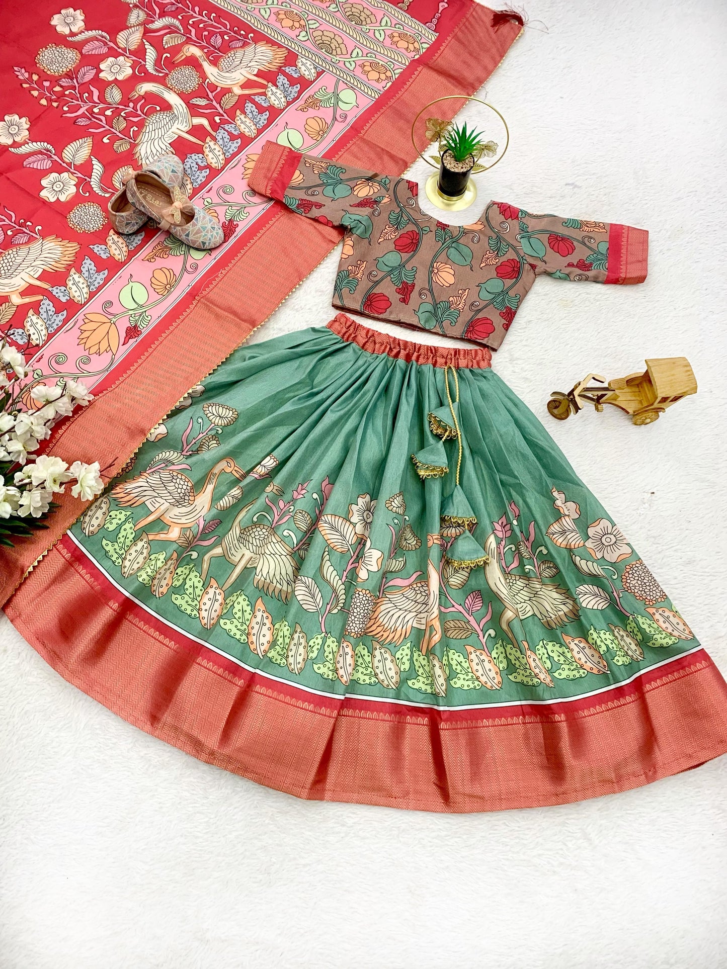 Green color dola silk kalamkari printed lehenga choli with dupatta price
