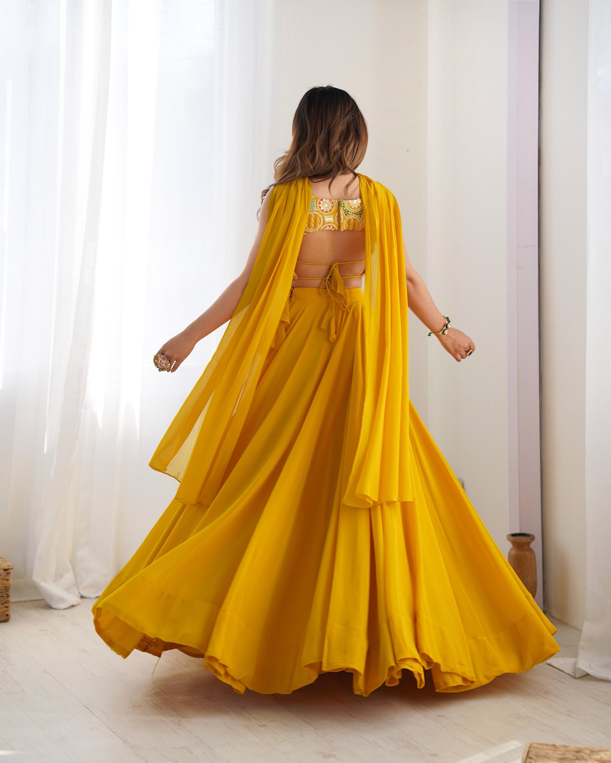 Yellow color georgette lehenga choli with dupatta price