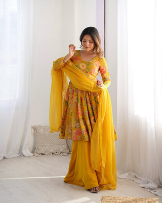 Yellow color roman silk chanderi sharara suit with dupatta