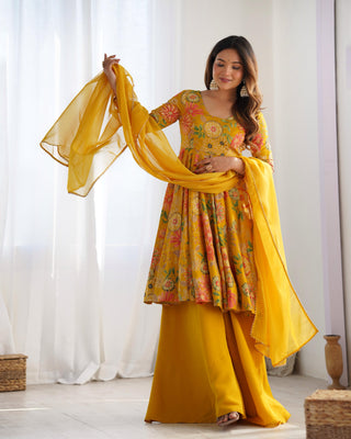 Yellow color roman silk chanderi sharara suit with dupatta price