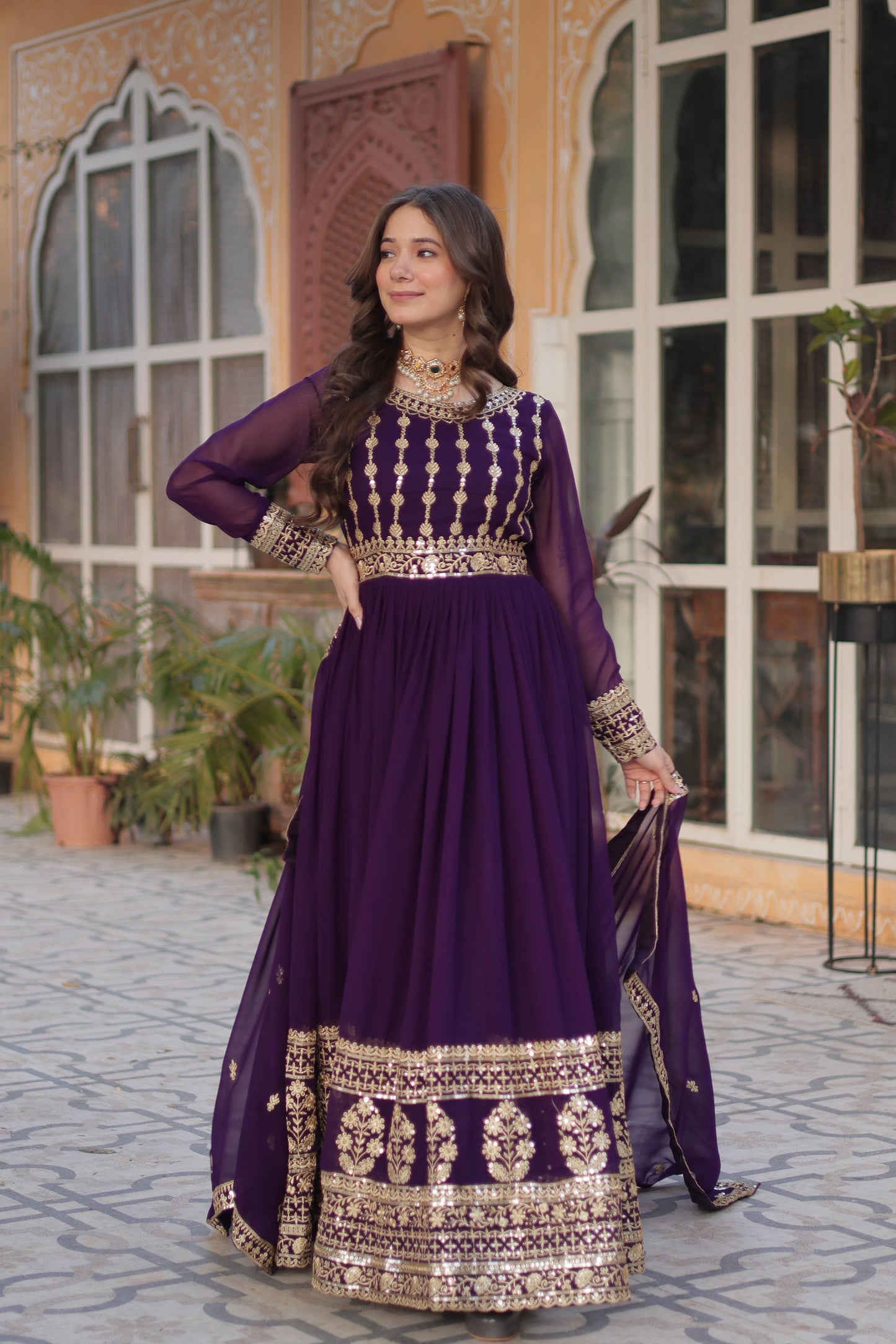Purple color faux blooming gown with dupatta images