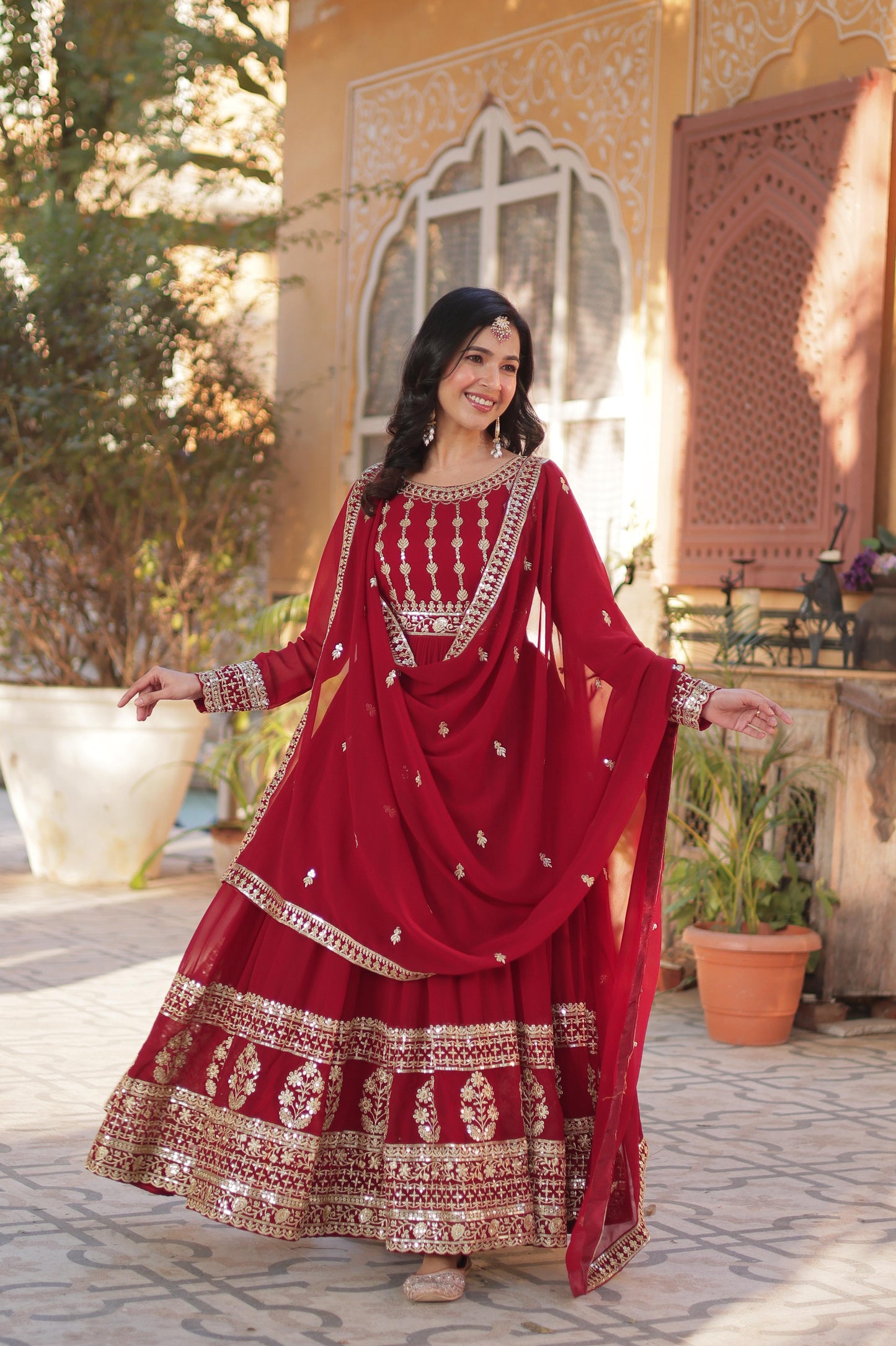 Red color faux blooming long gown with dupatta images