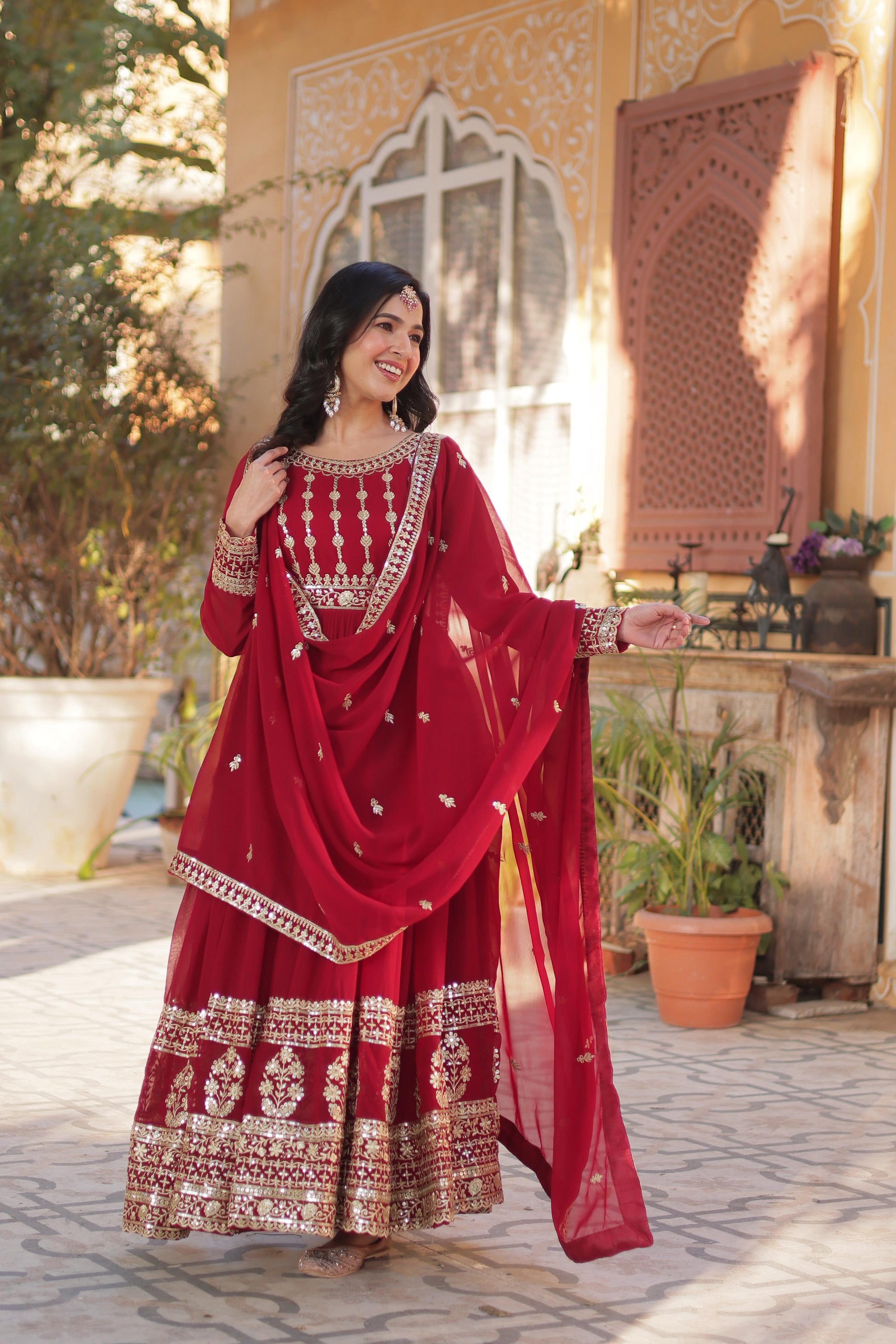 Red color faux blooming long gown for wedding
