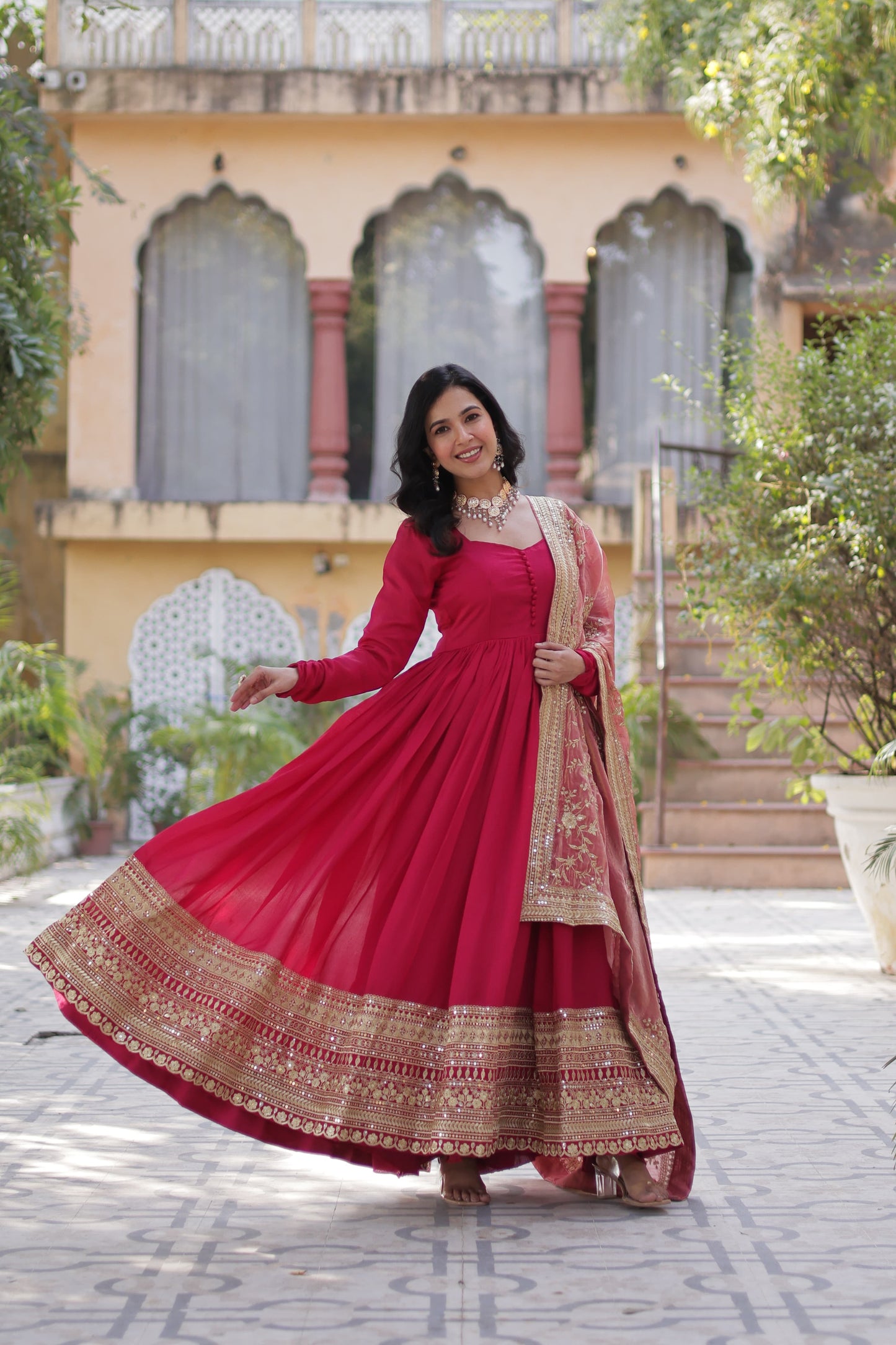 Pink color shimmer vichitra gown for women
