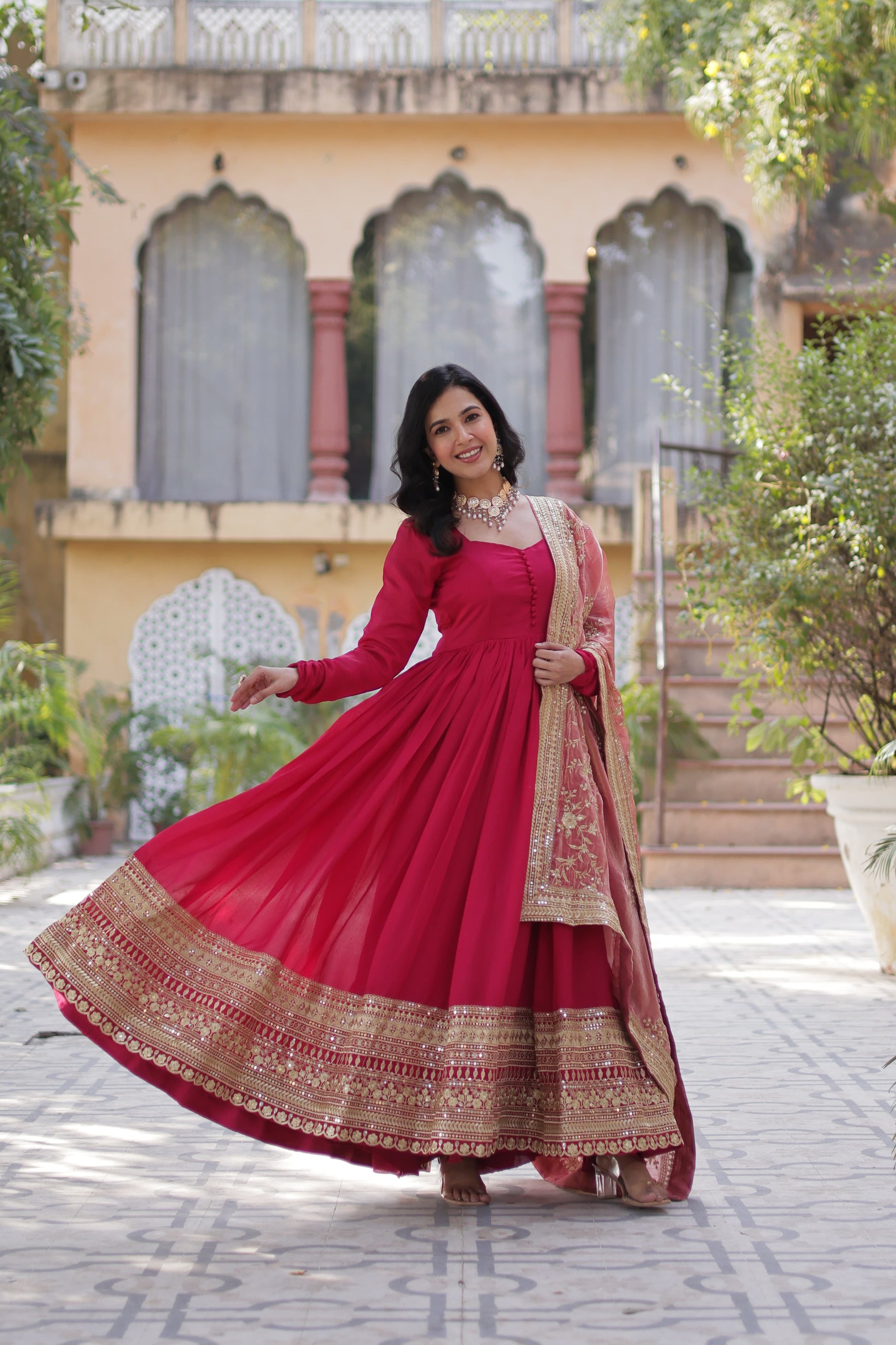 Pink color shimmer vichitra gown for women