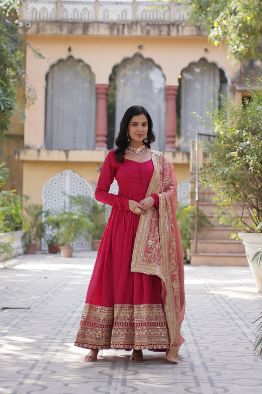 Pink color shimmer vichitra gown with dupatta images