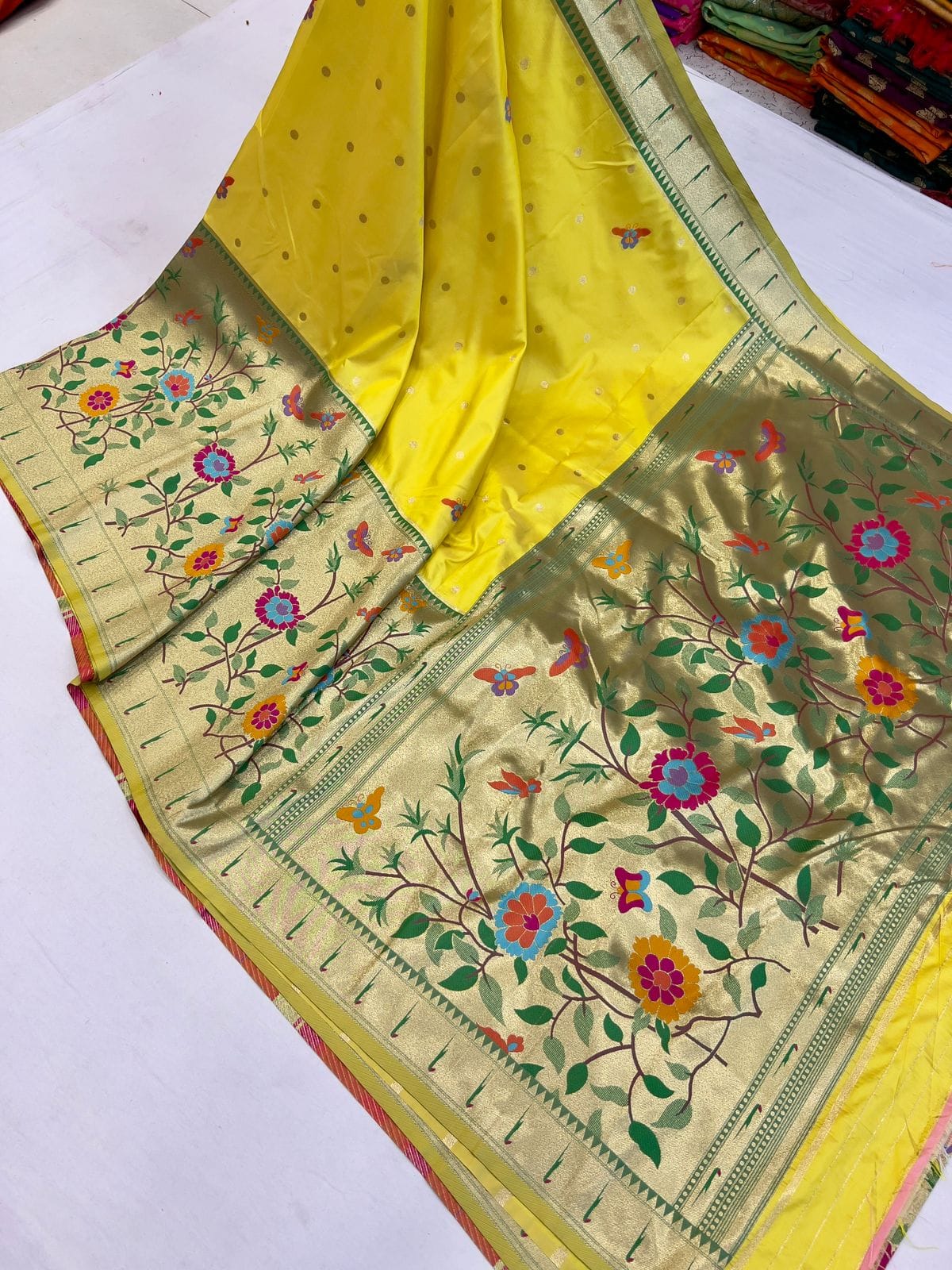 Yellow color paithani saree with blouse for haldi rasam