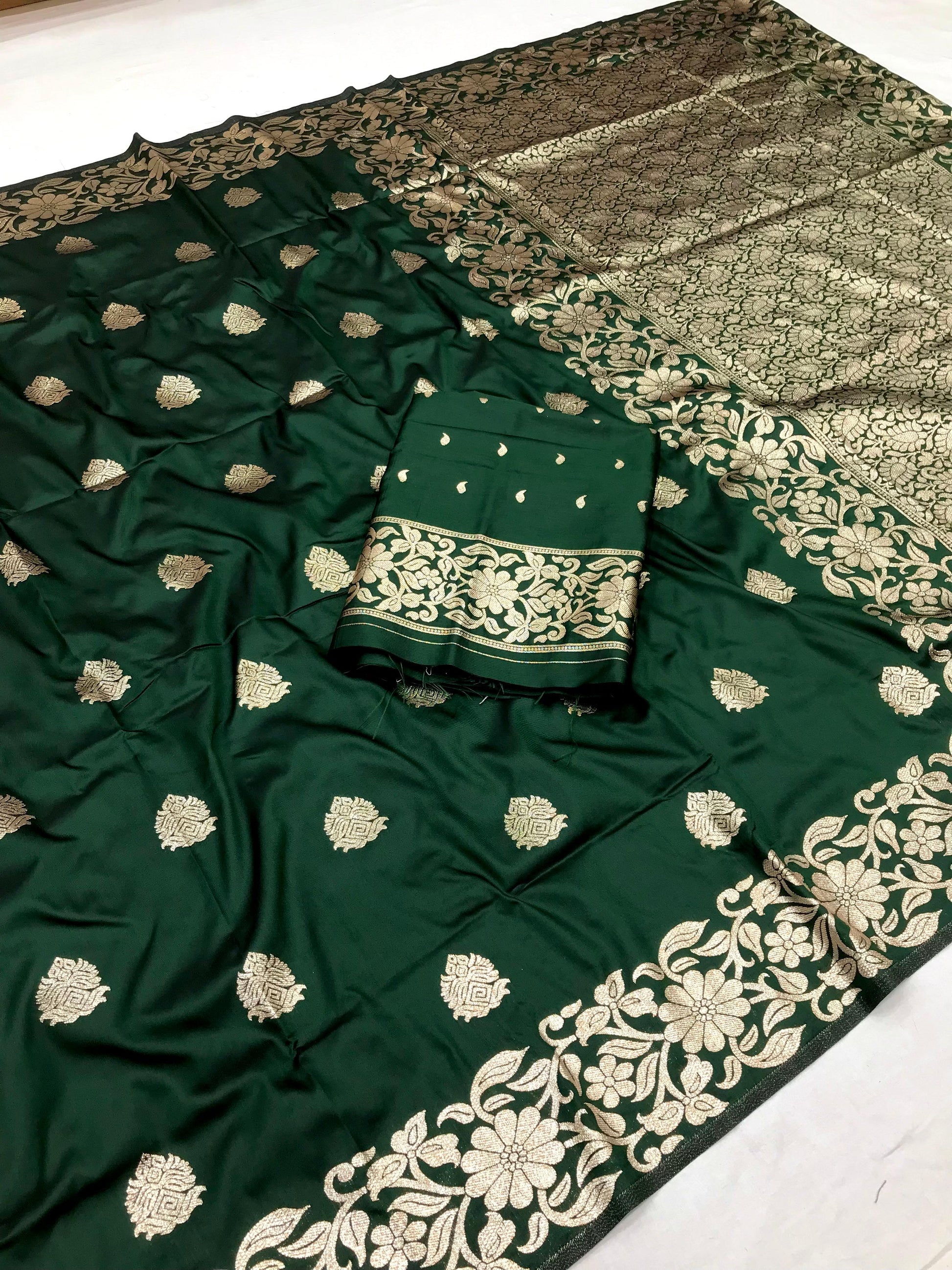 Green color banarasi silk saree with blouse images