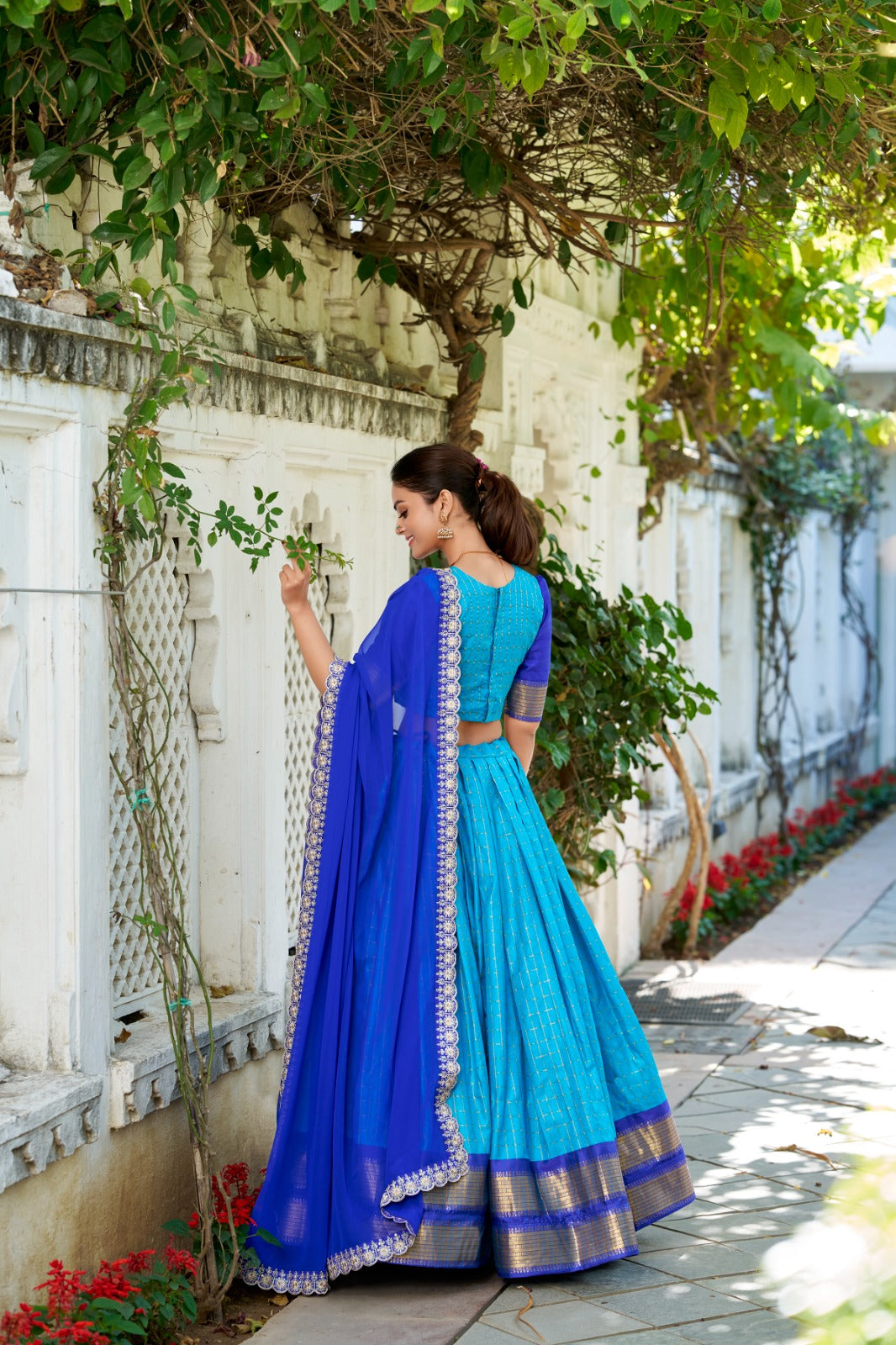 Blue color zari weaving chex lehenga choli for women