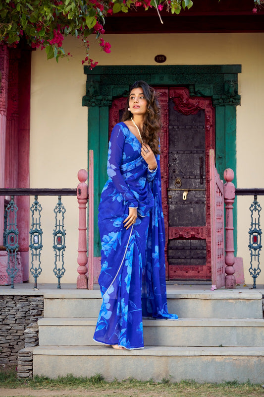 Blue color chiffon printed saree for party