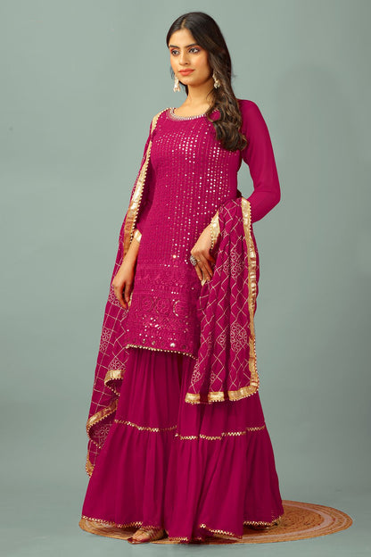 Pink color georgette sharara suit with dupatta 