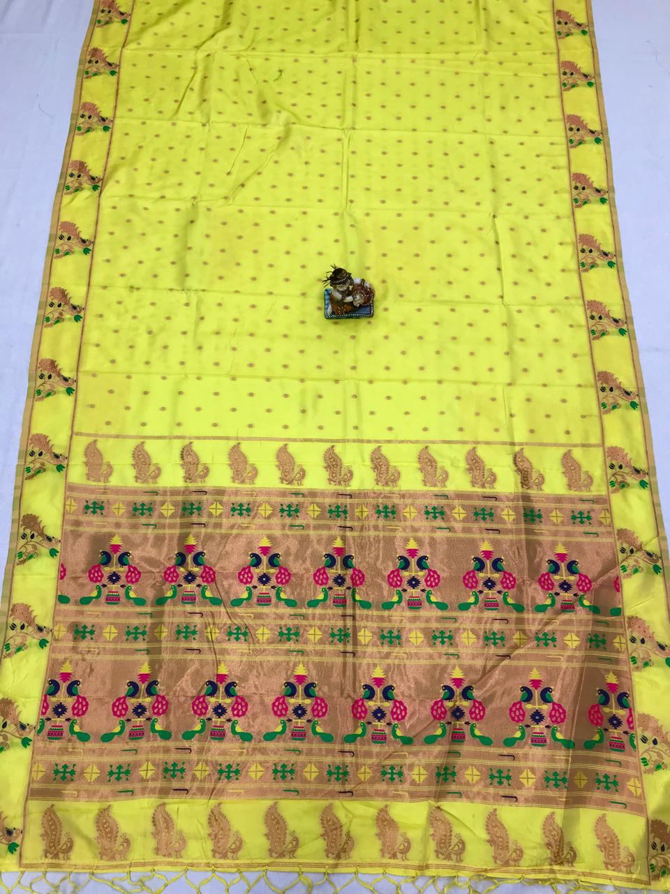 Yellow color lichi silk saree with blouse
