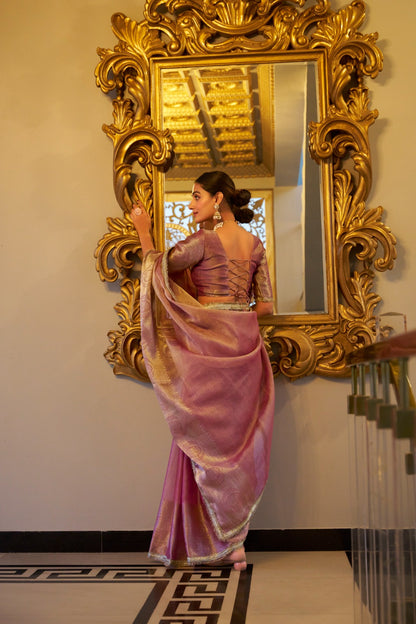 Light pink color tissue shimmer saree with blouse