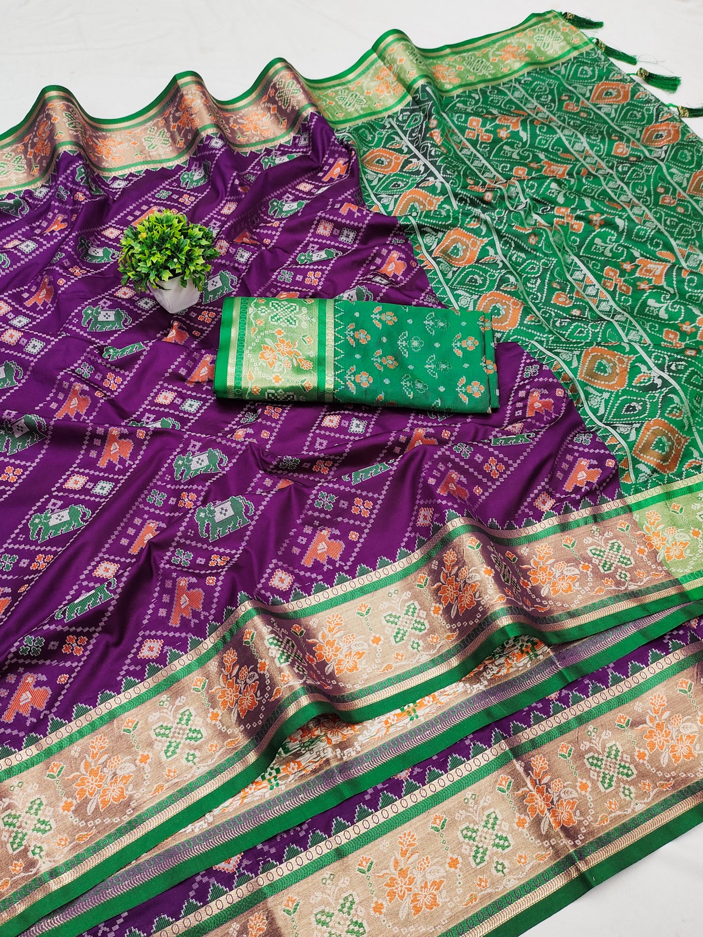 Purple color patola silk saree price
