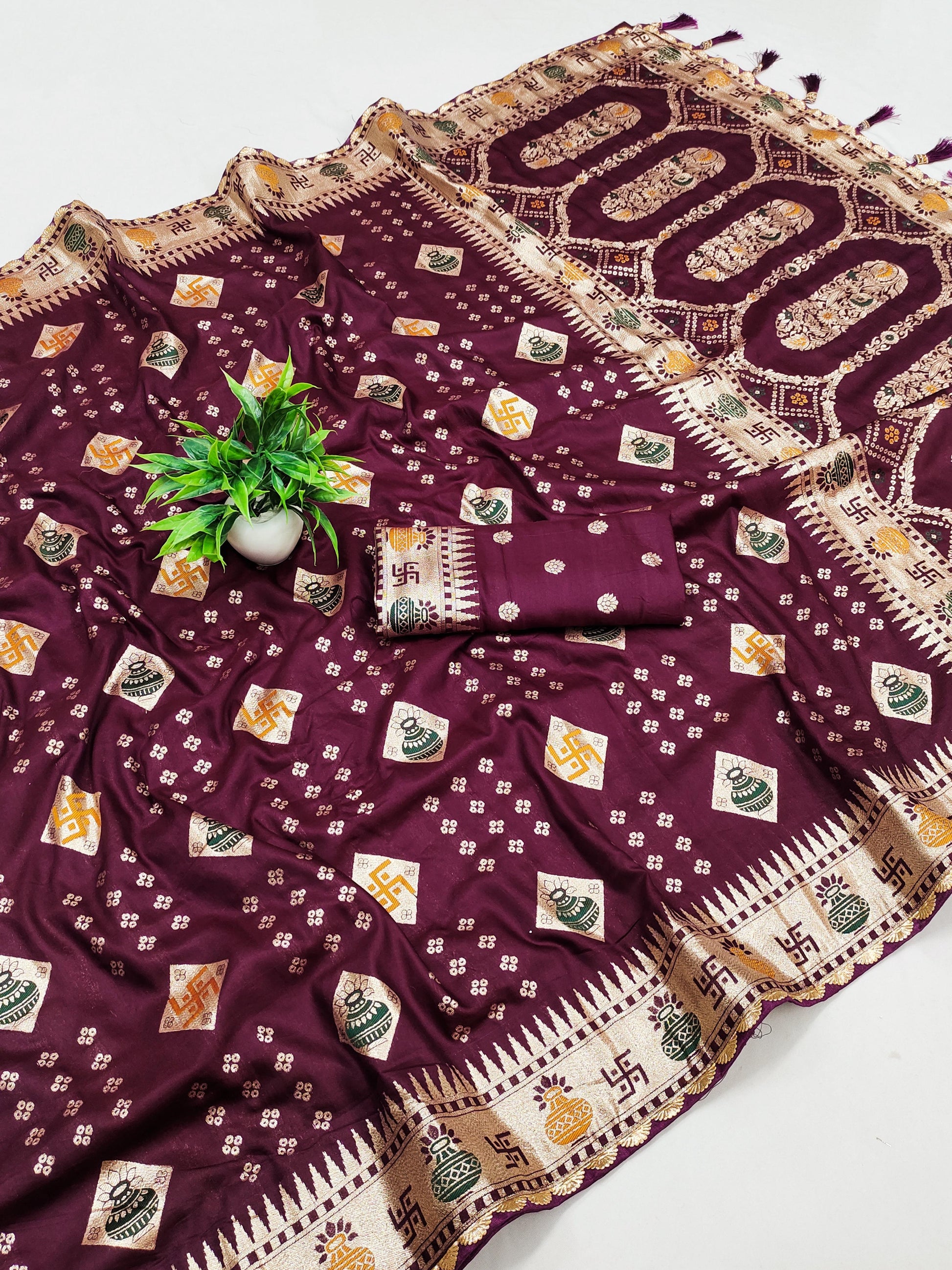 Maroon color Viscose dola silk sarees with blouse