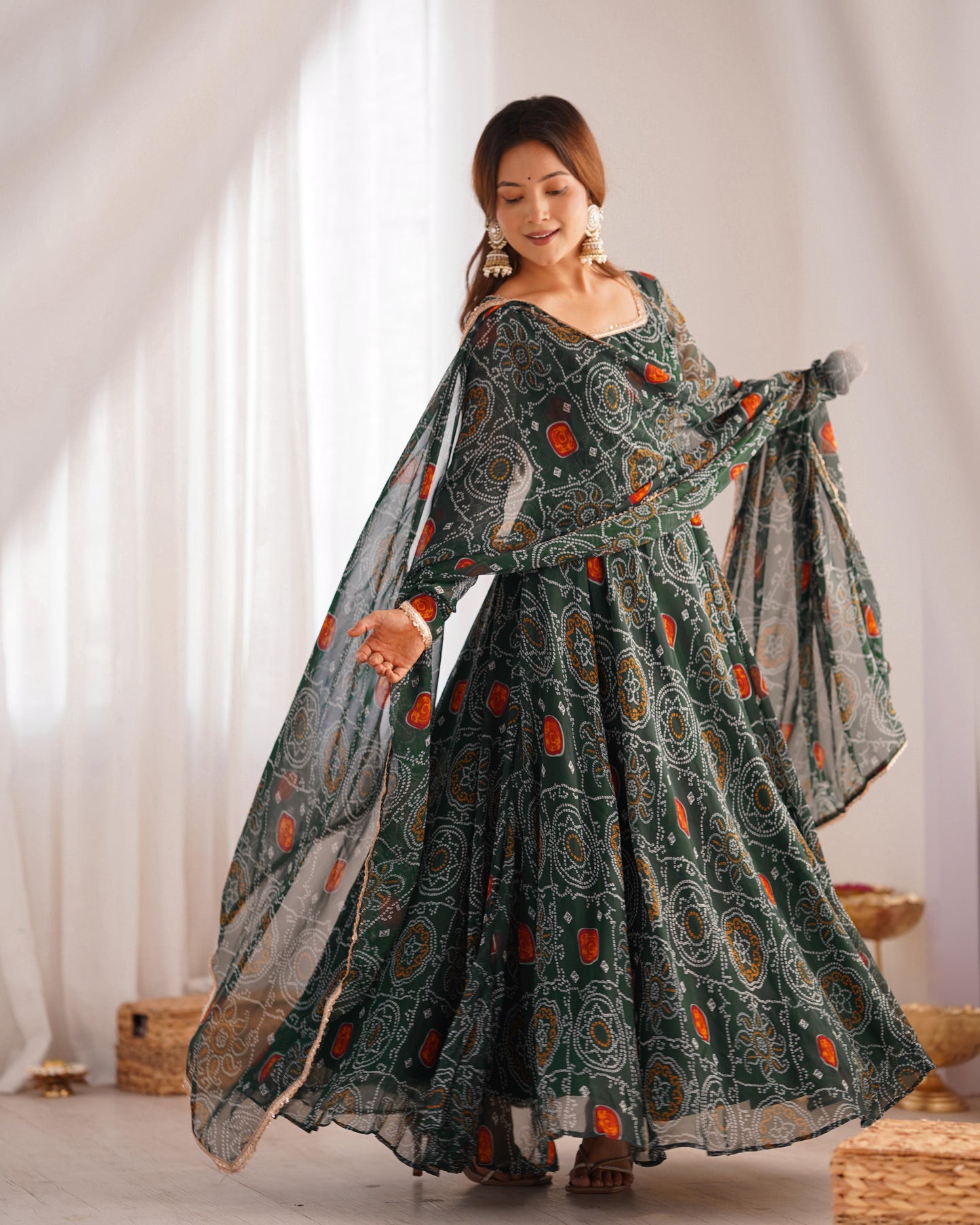 Green color chifforn bandhej gown for wedding