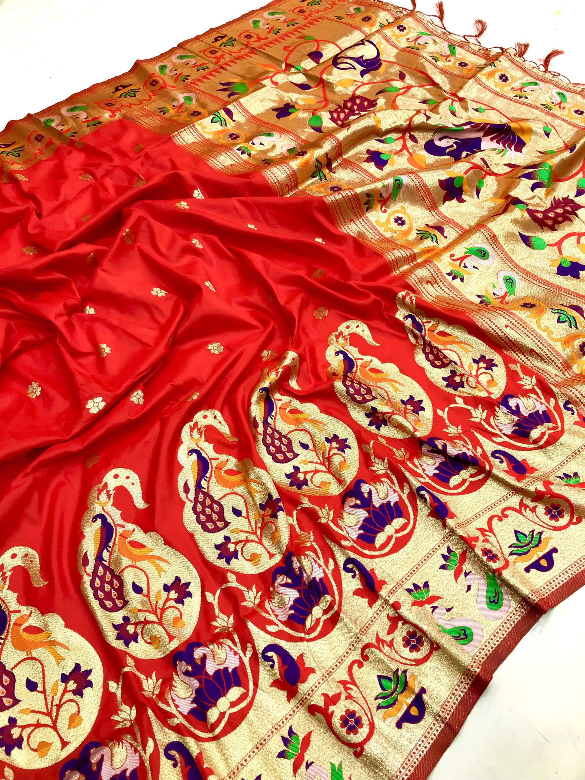 Red color paithani silk saree for women with design
