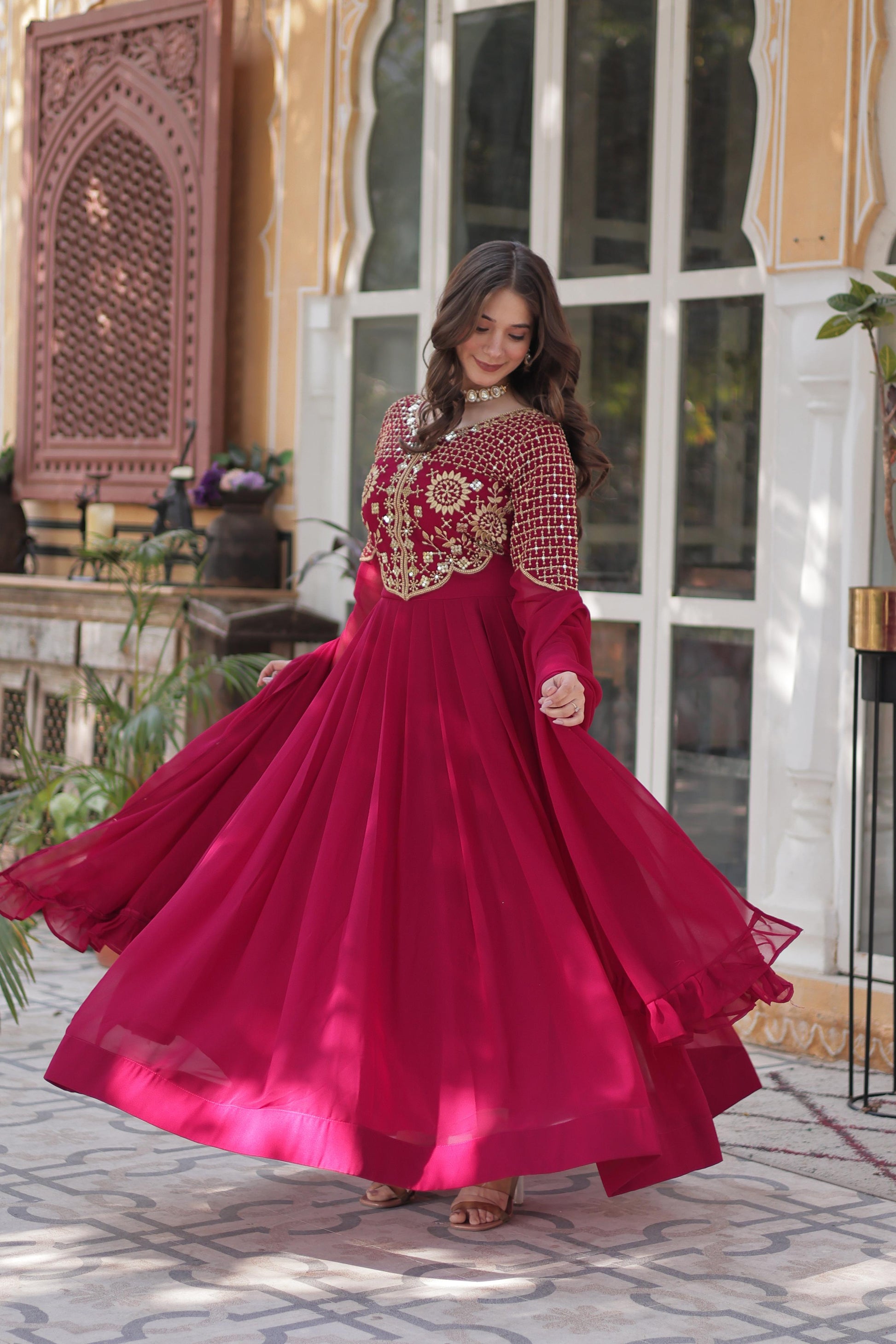 Pink color faux blooming gown for women