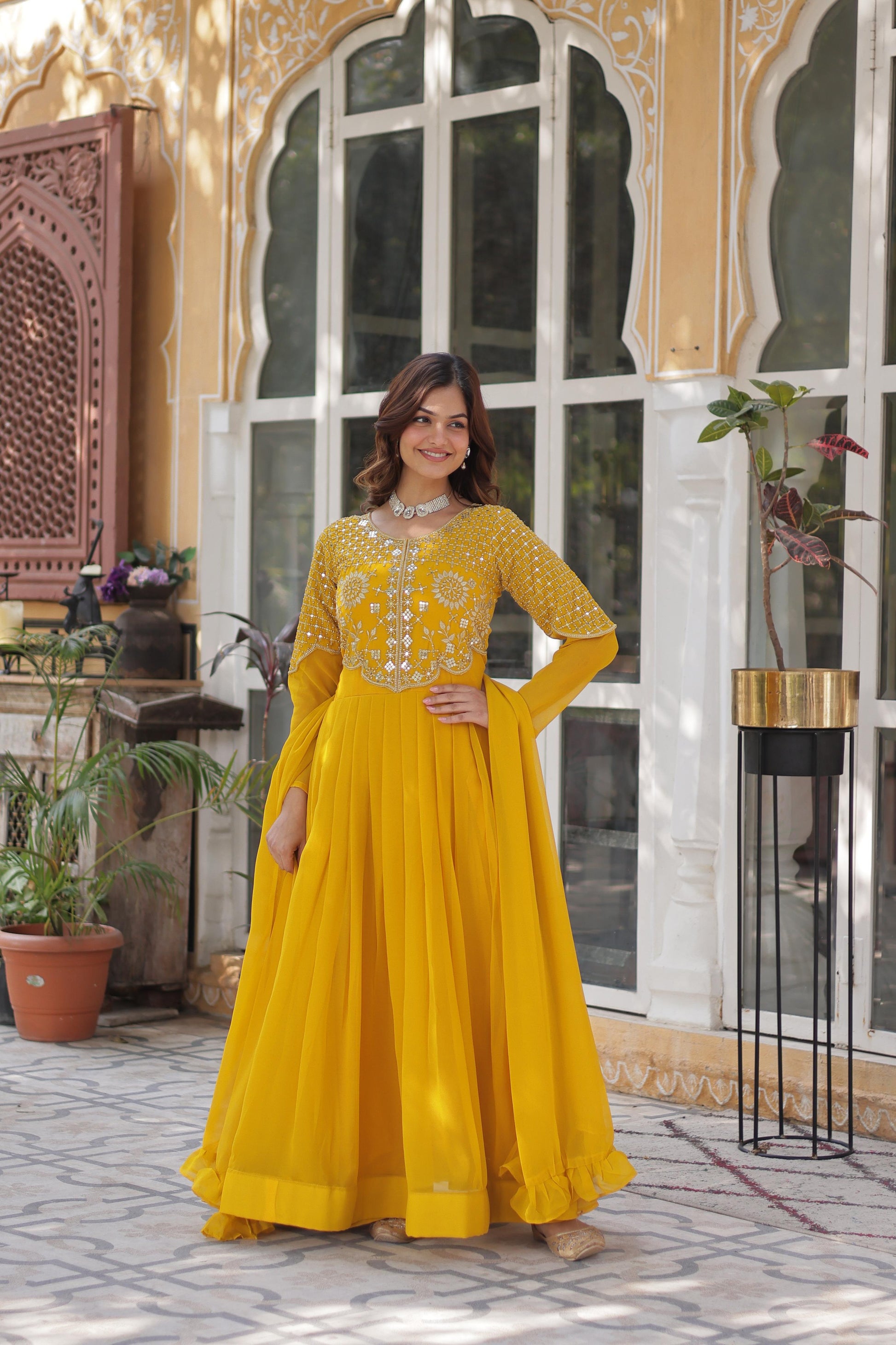 Demanding Yellow Color Faux Blooming Designer Gown For Engagement Ragthm Demanding Yellow Color Faux Blooming Designer Gown For Engagement Ragthm