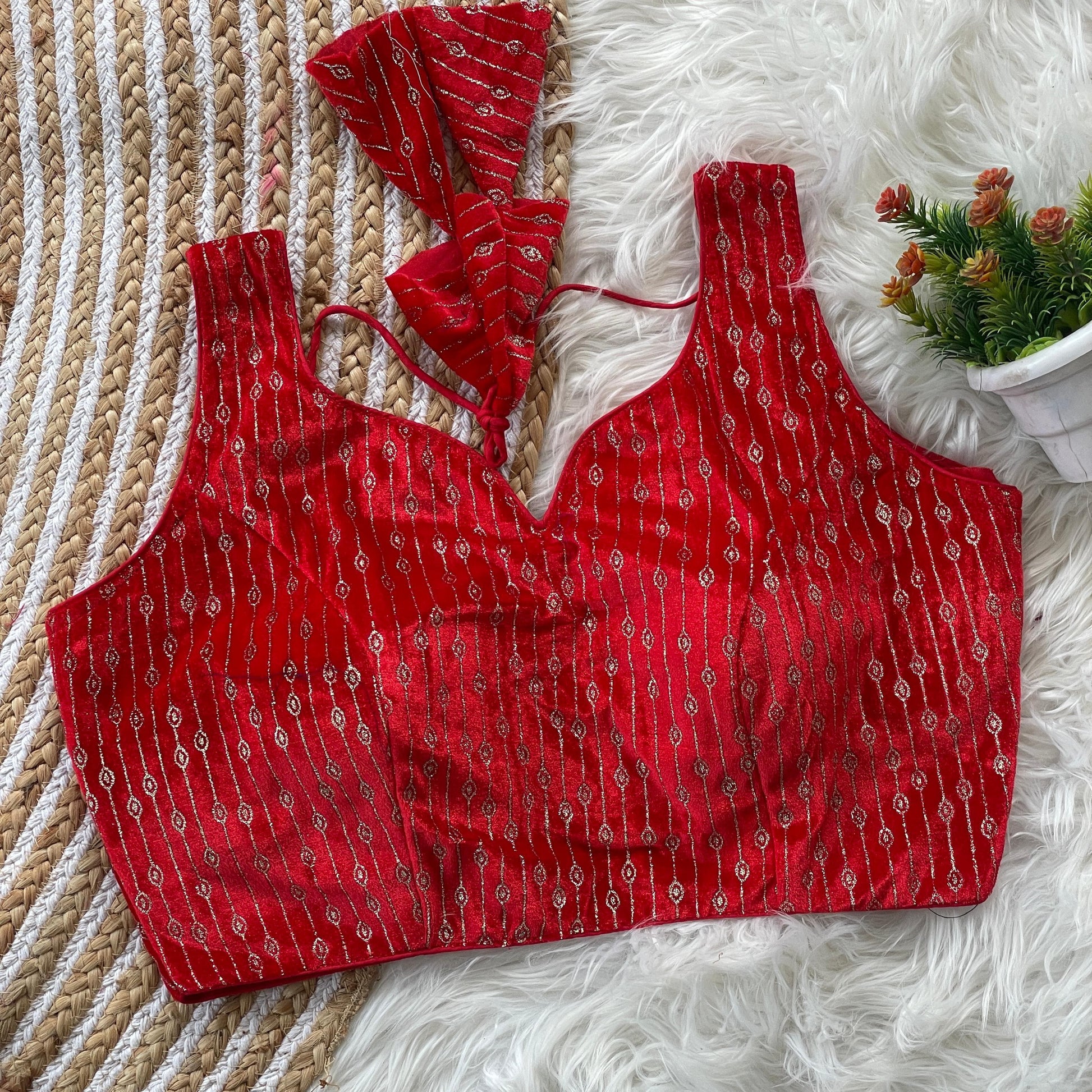 Red color velvet printed blouse with images