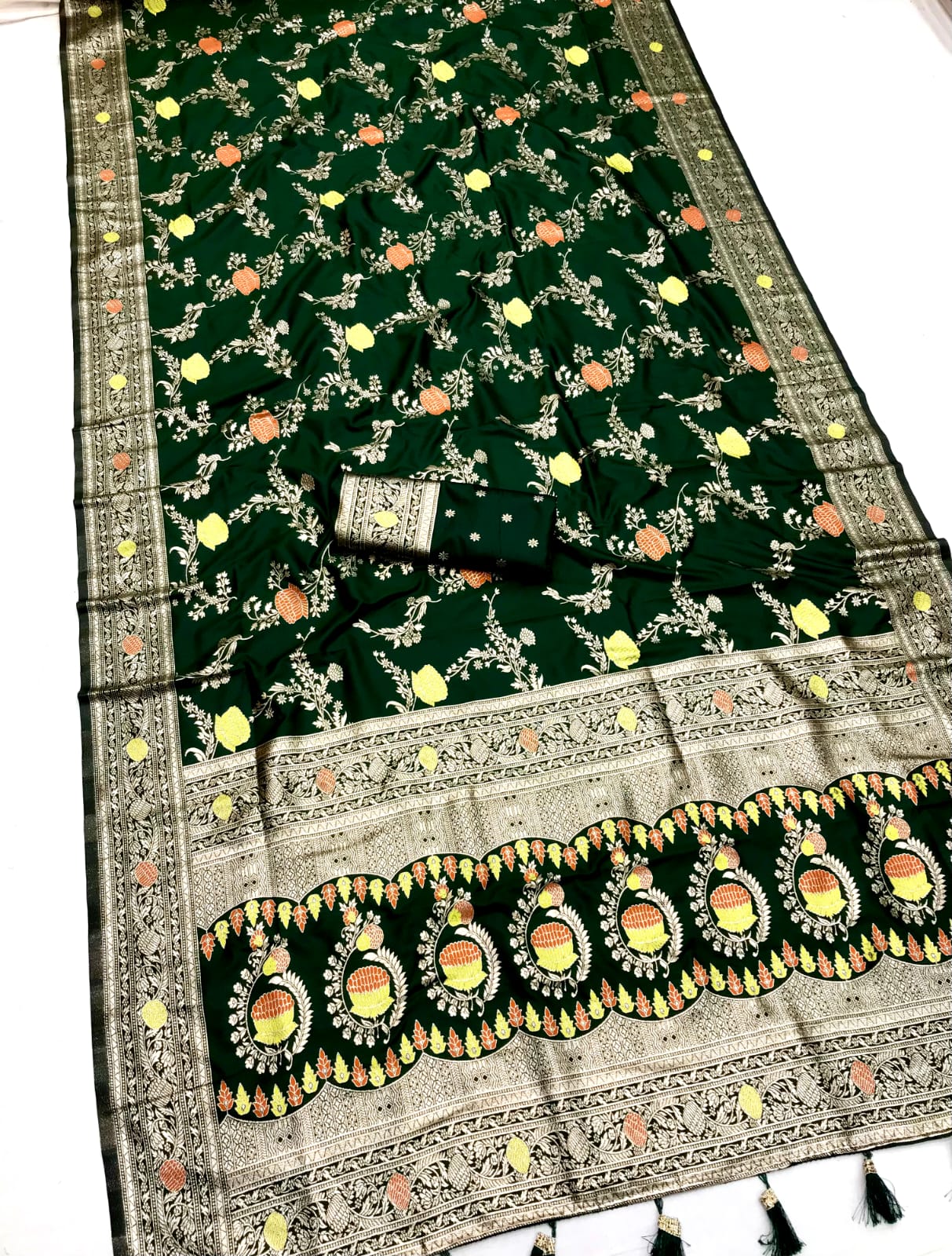 Dark green color banarasi silk sarees for engagement