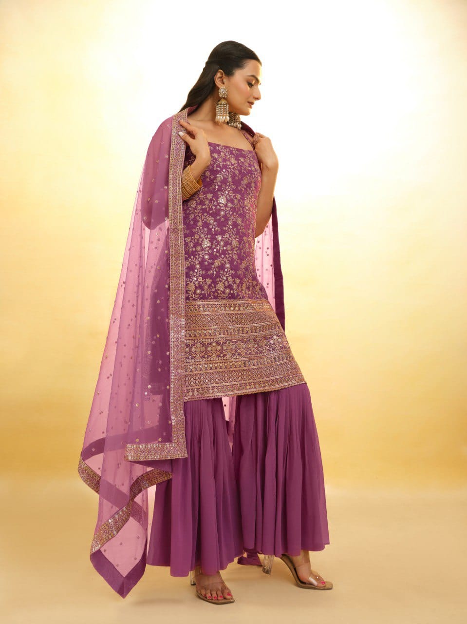 Purple color georgette sharara suit with dupatta