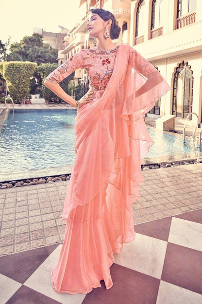 Peach color organza saree for party