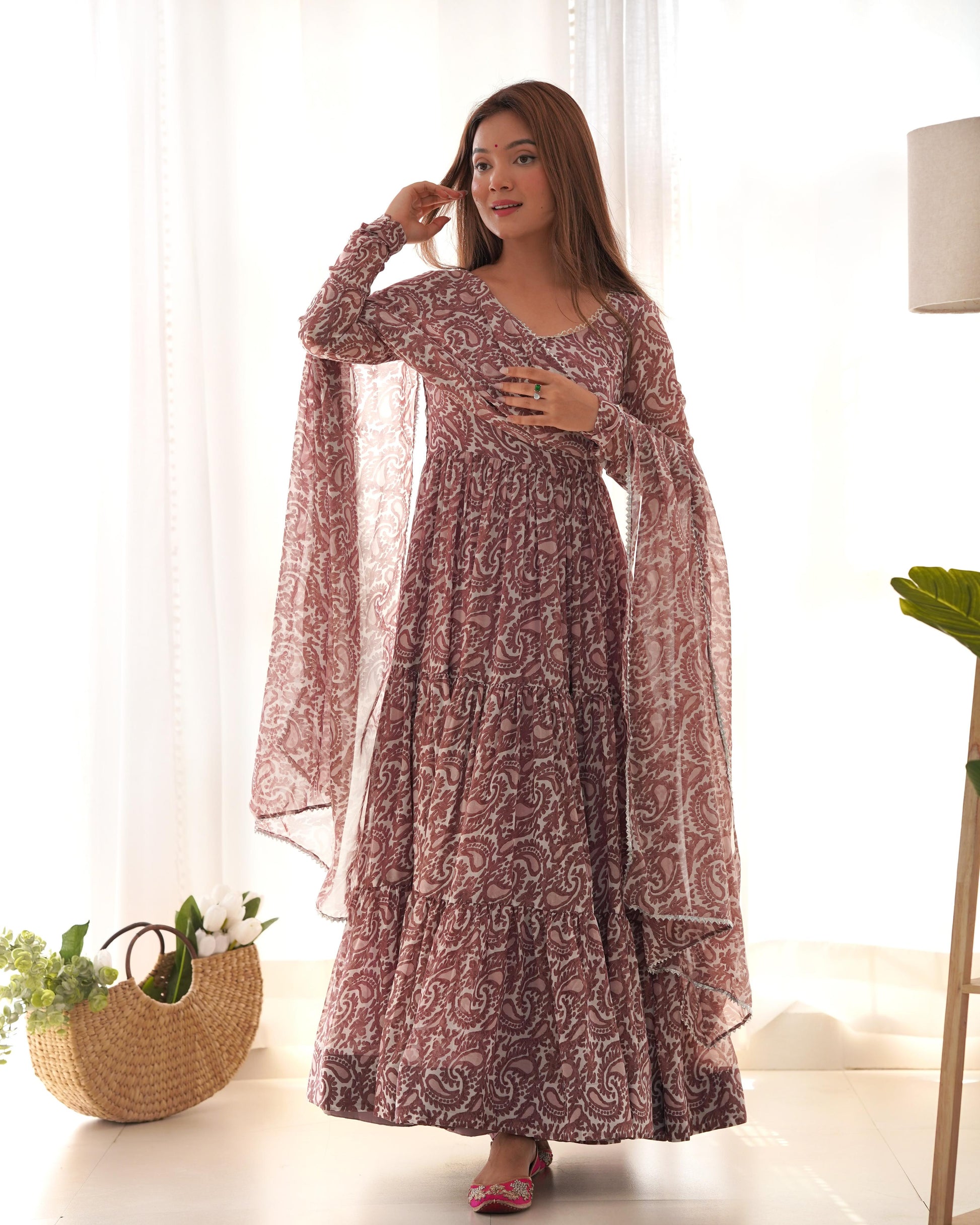 Brown color georgette printed long gown