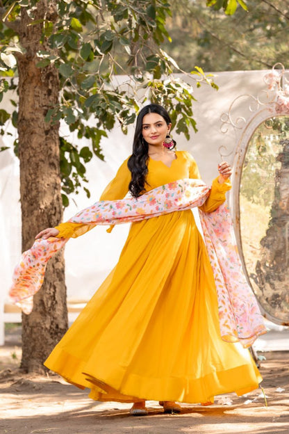 Yellow color soft organza long gown for women