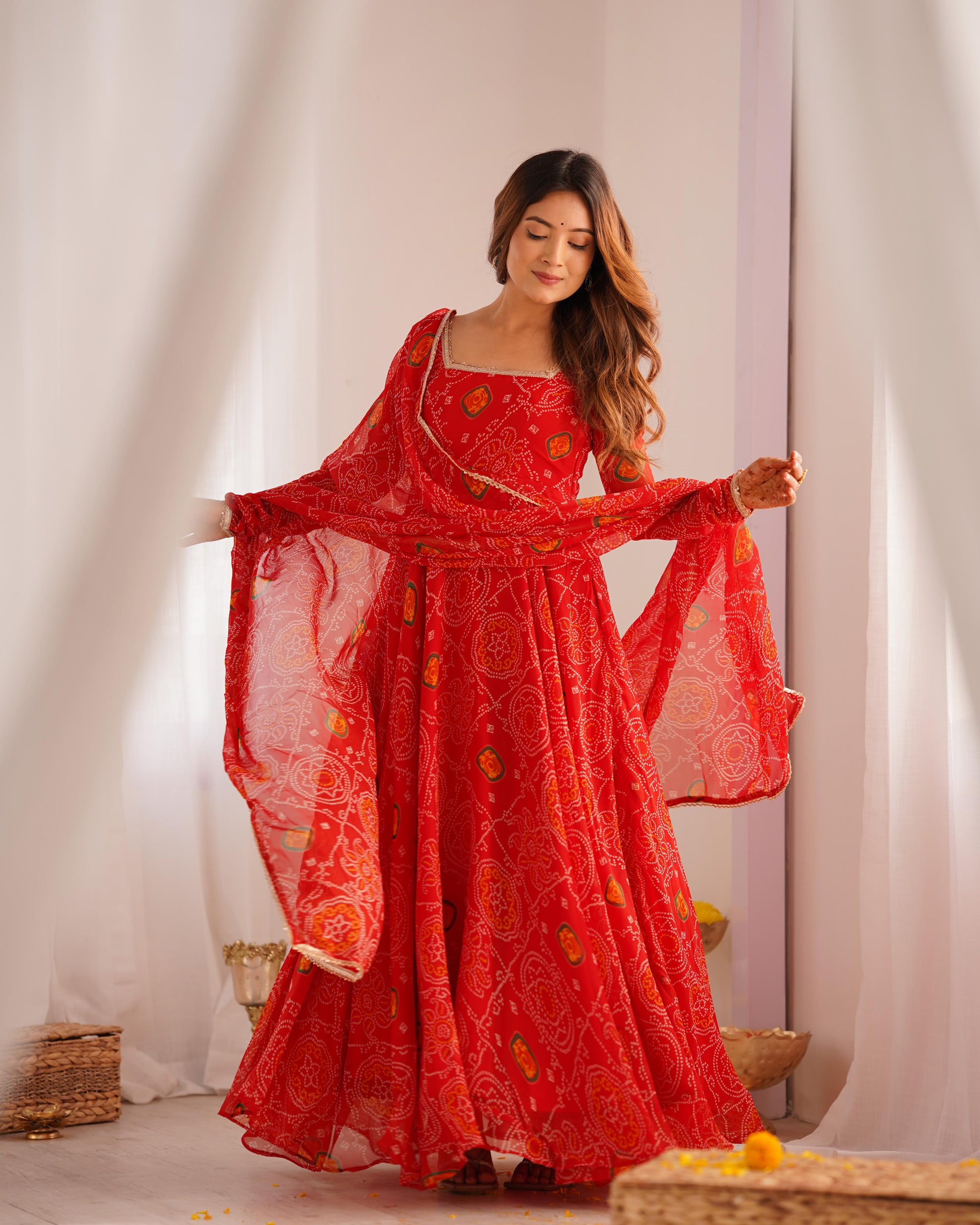 Red color chiffon bandhej long gown with dupatta