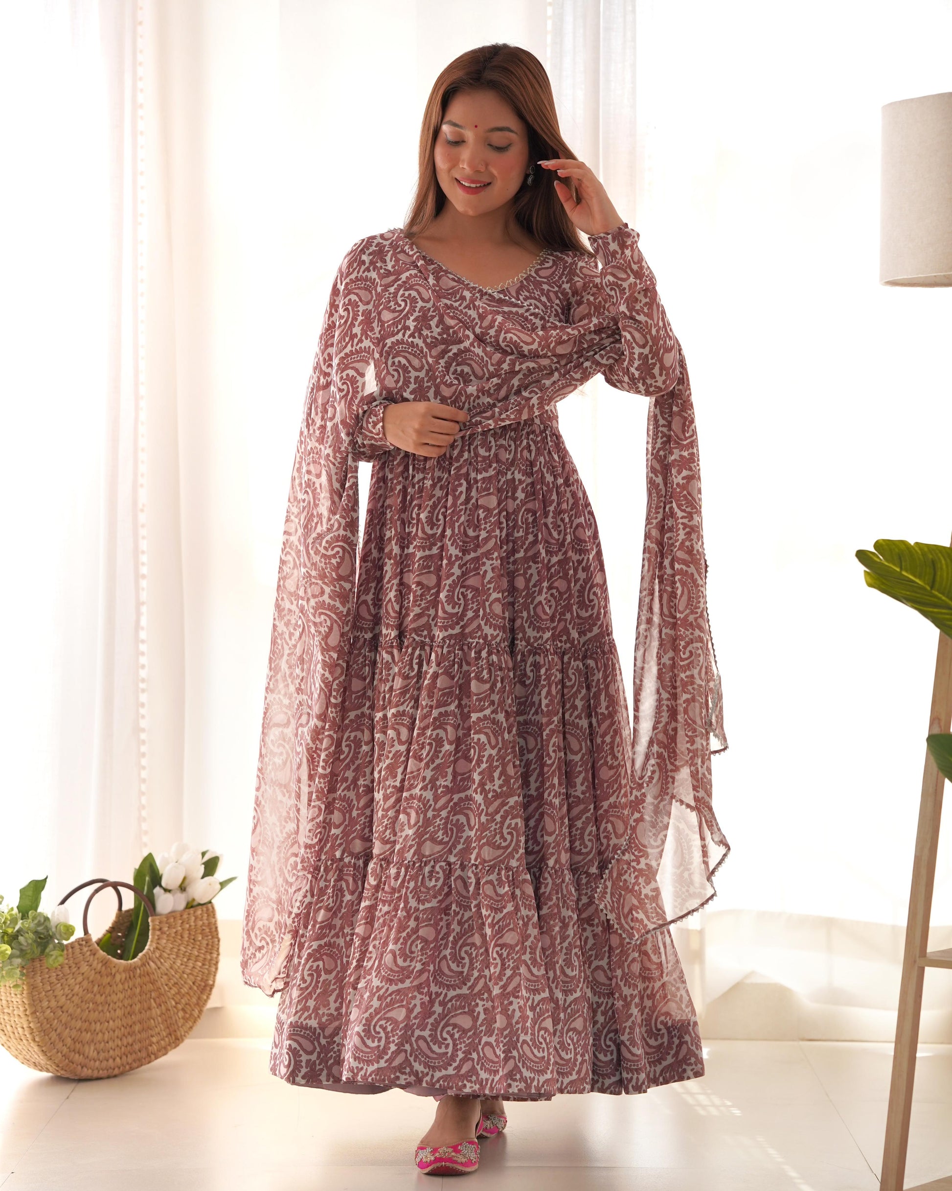 Brown color georgette printed long gown for women