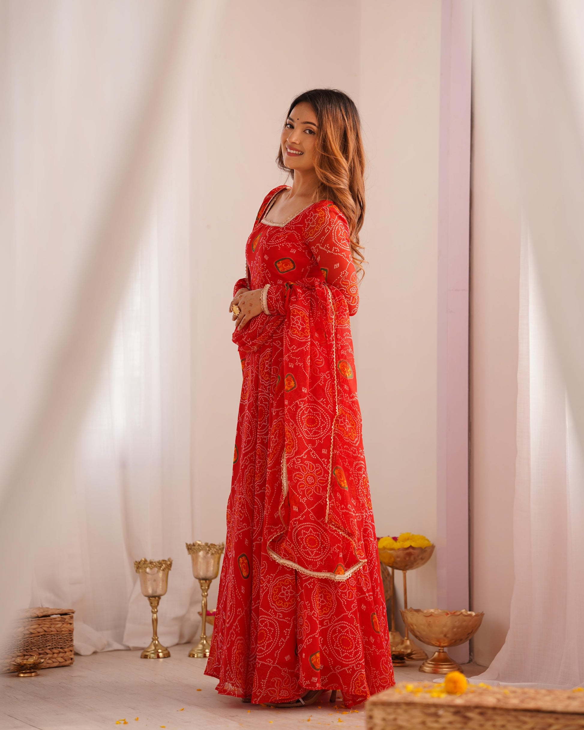 Red color chiffon bandhej long gown for wedding