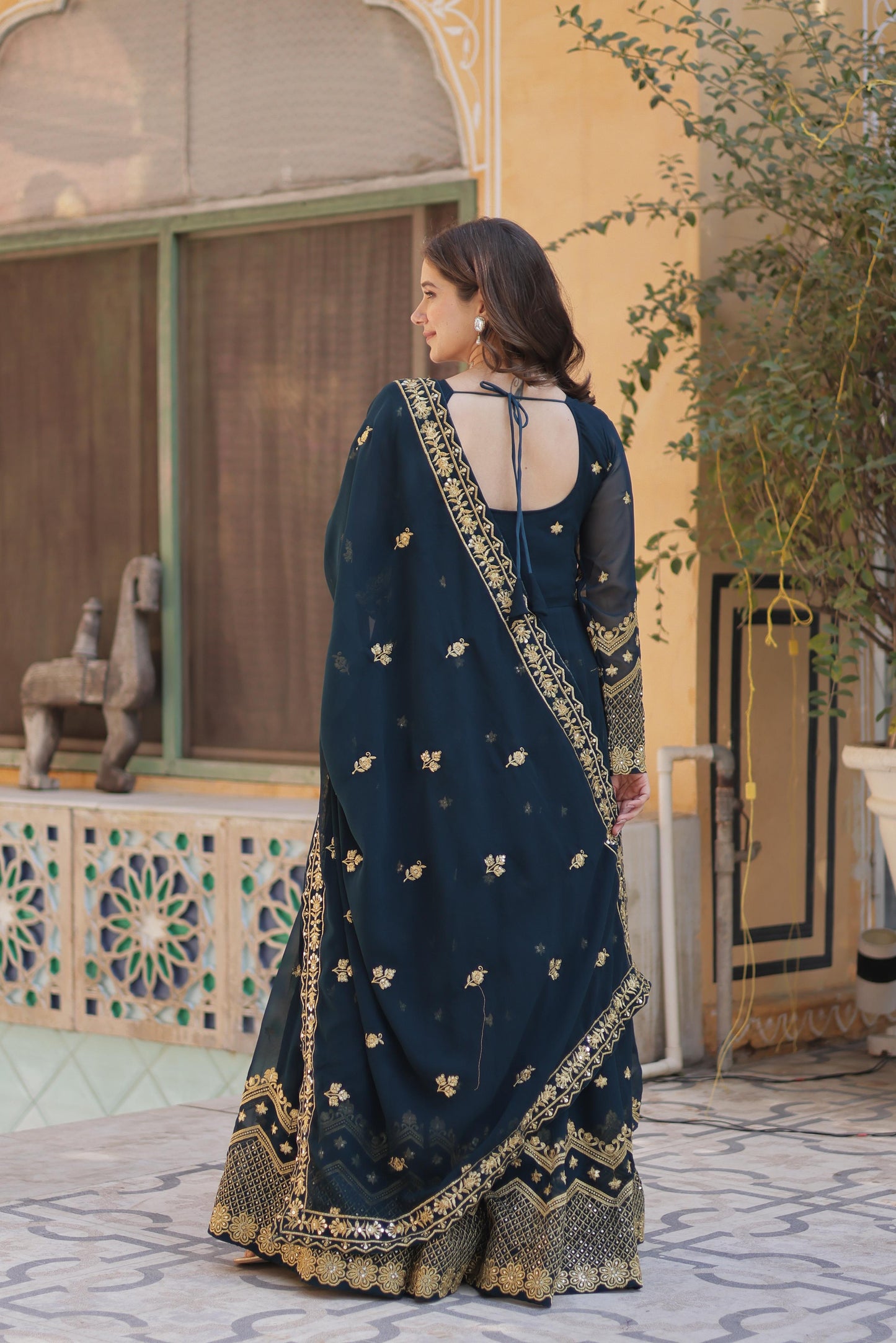 Teal blue color faux blooming anarkali gown images