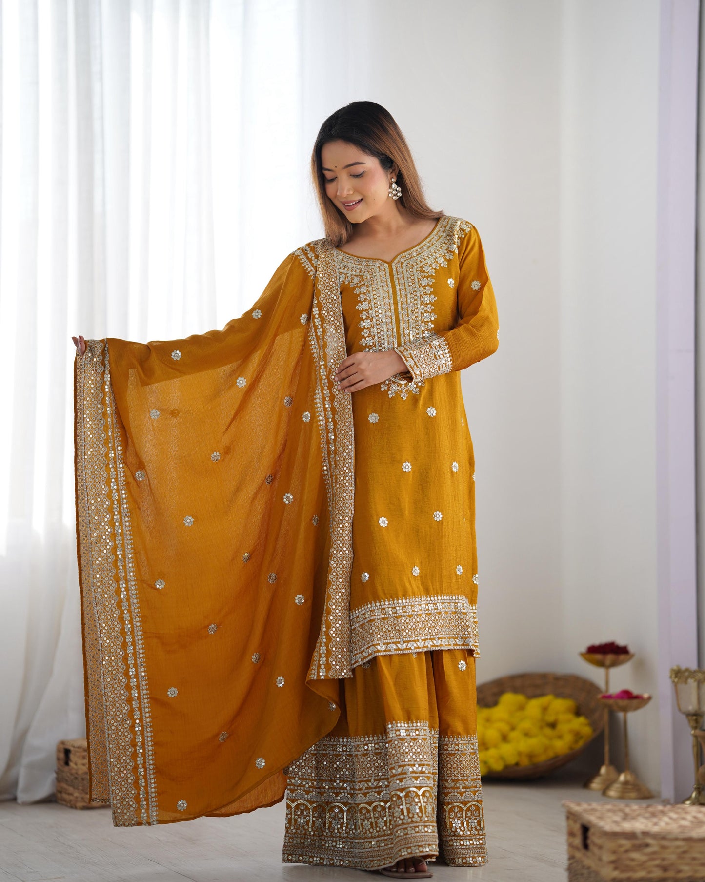 Yellow color chinon silk sharara suit with dupatta price