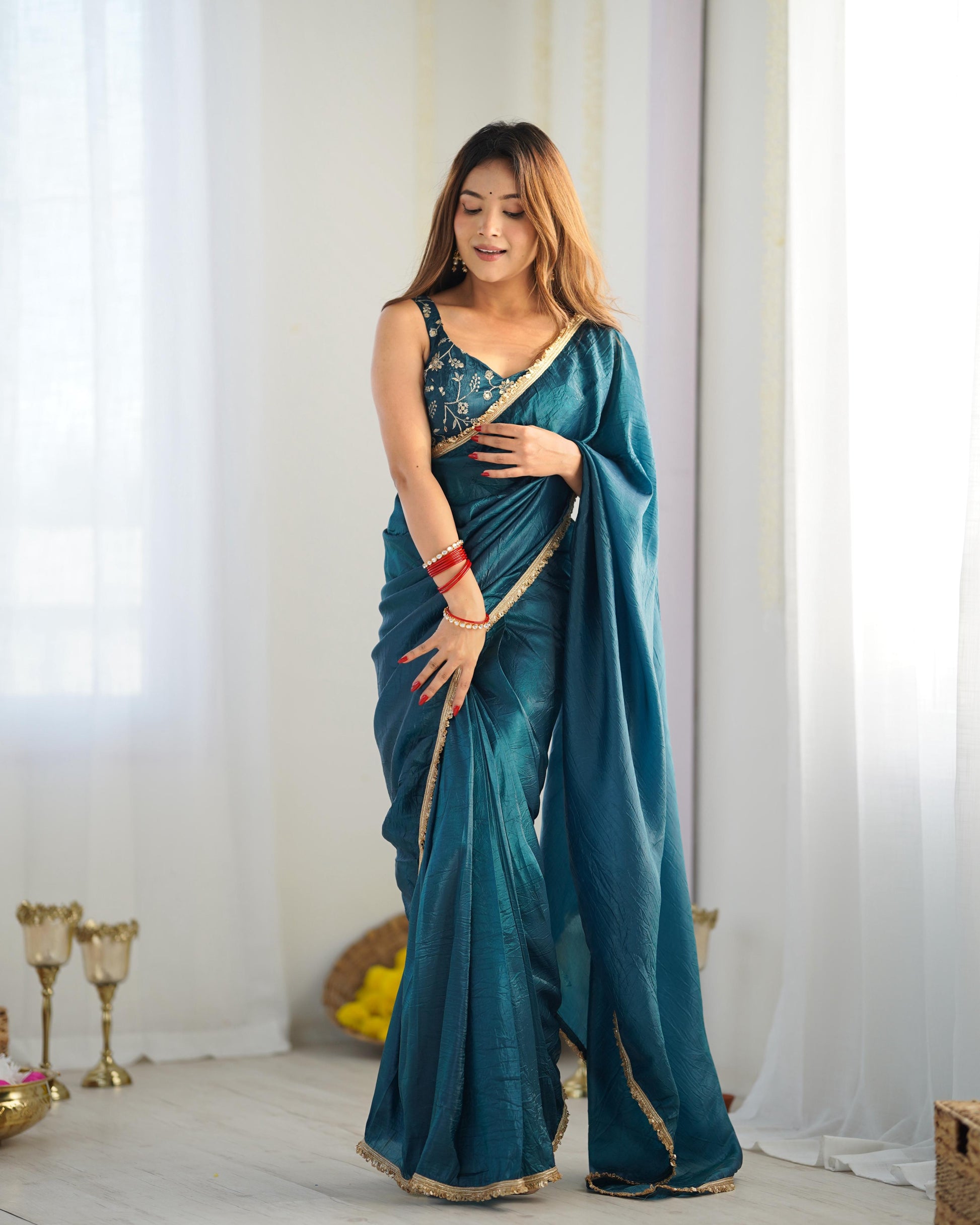 Teal blue color gold crush tissue silk saree images