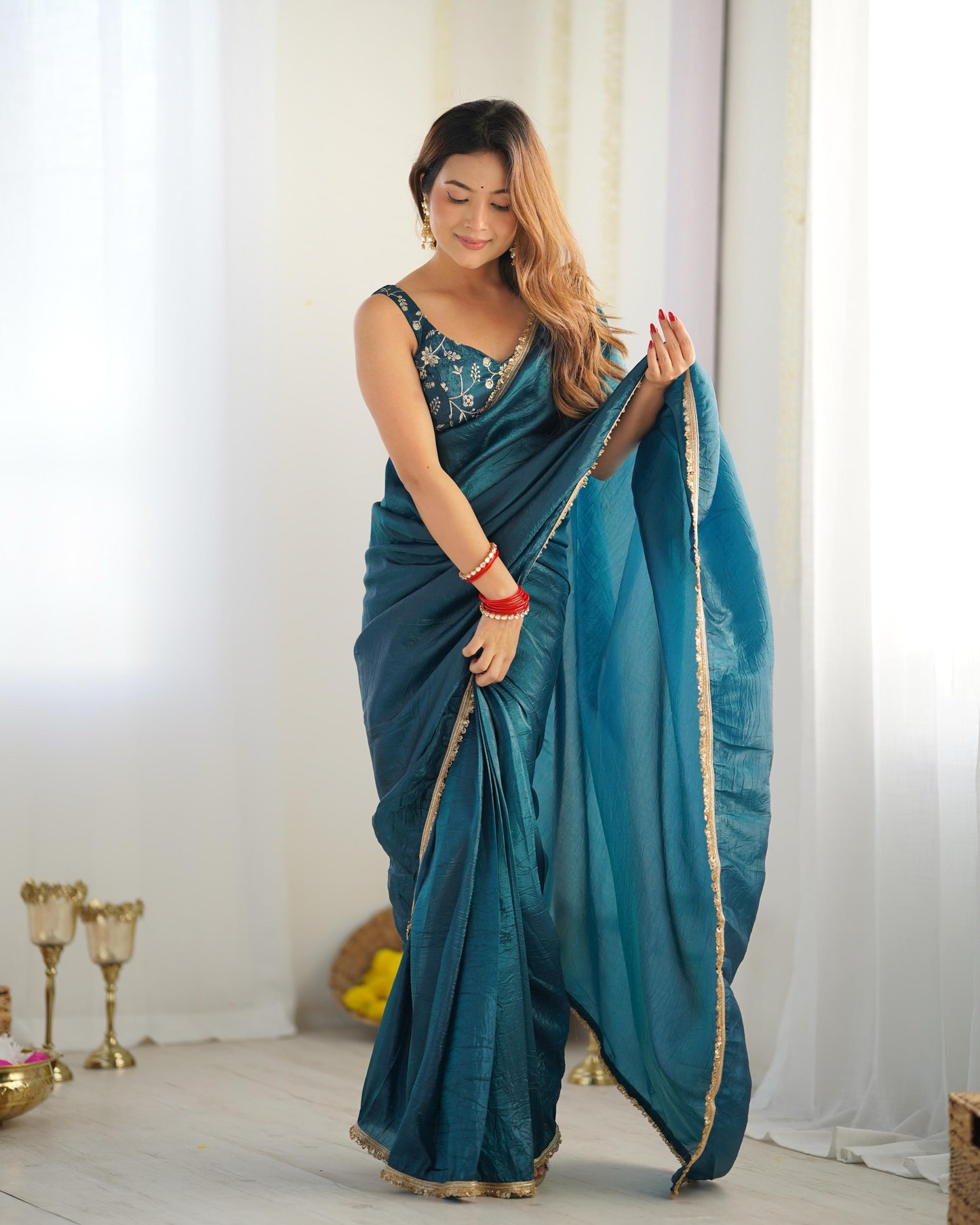 Teal blue color gold crush tissue silk saree design