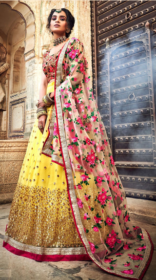 soft net yellow lehenga with pink blouse