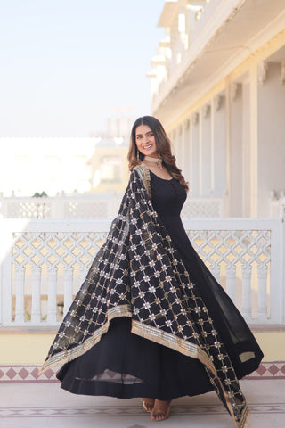 Long sleeve black colour gown for wedding