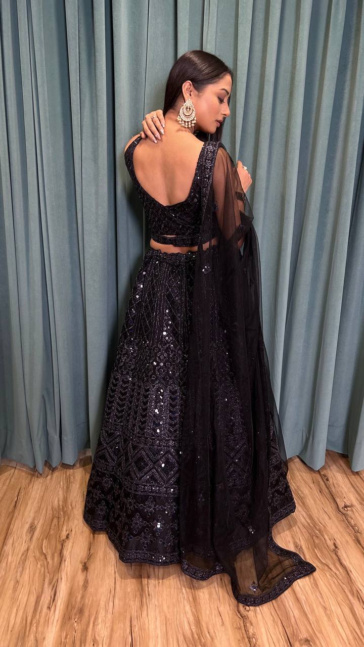 Modern black color soft net lehenga choli for sangeet function