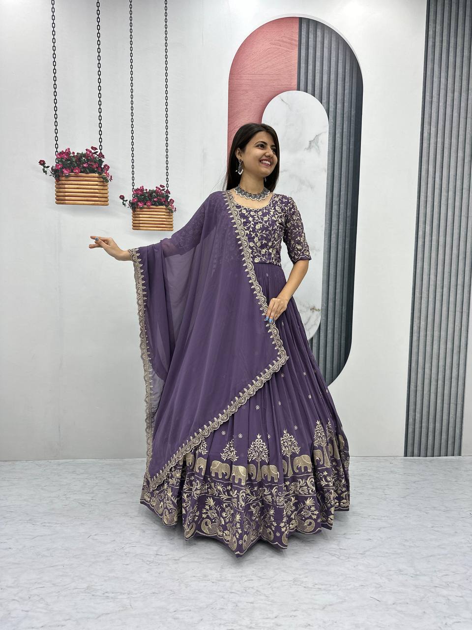 Purple color georgette gown for women
