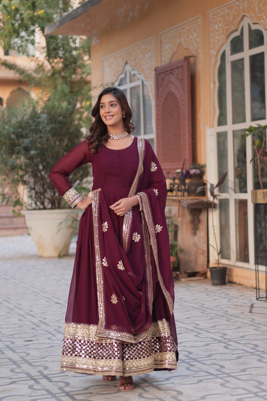 Maroon color faux blooming long gown with dupatta 