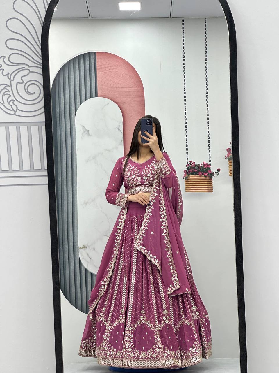 Pink color georgette lehenga choli with dupatta
