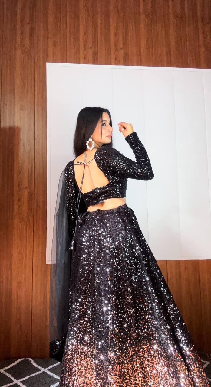 Modern black lehenga for reception
