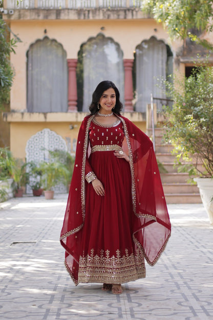 Red color faux blooming long gown with dupatta images