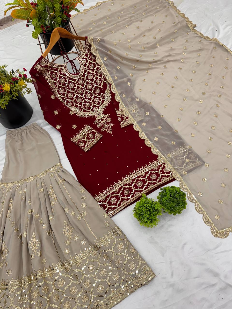 Maroon color georgette sharara suit with dupatta images