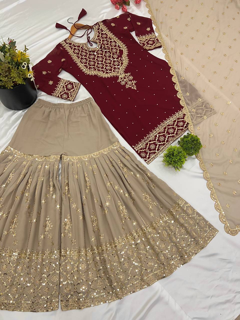 Maroon color georgette sharara suit with dupatta design 