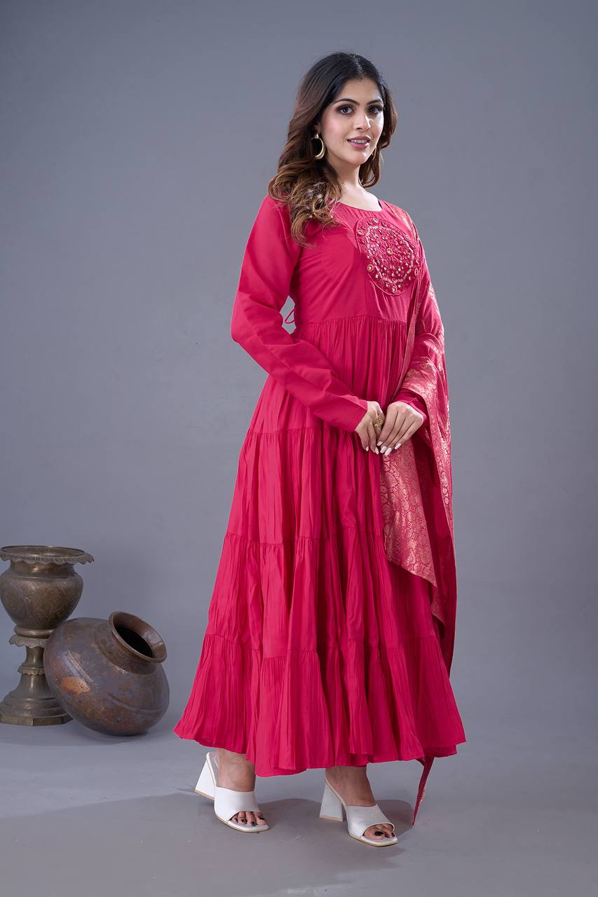 Pink color roman silk long gown for party
