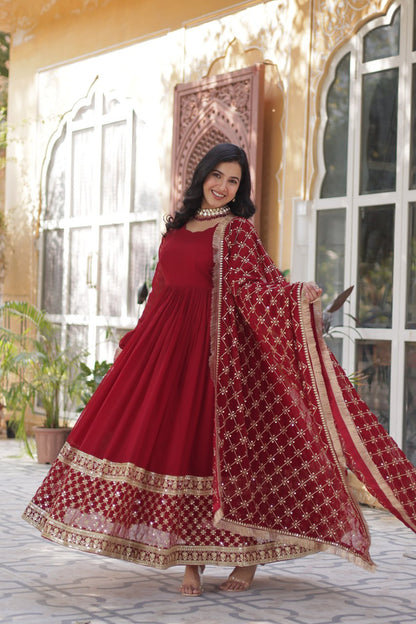 Maroon color faux blooming gown with dupatta images