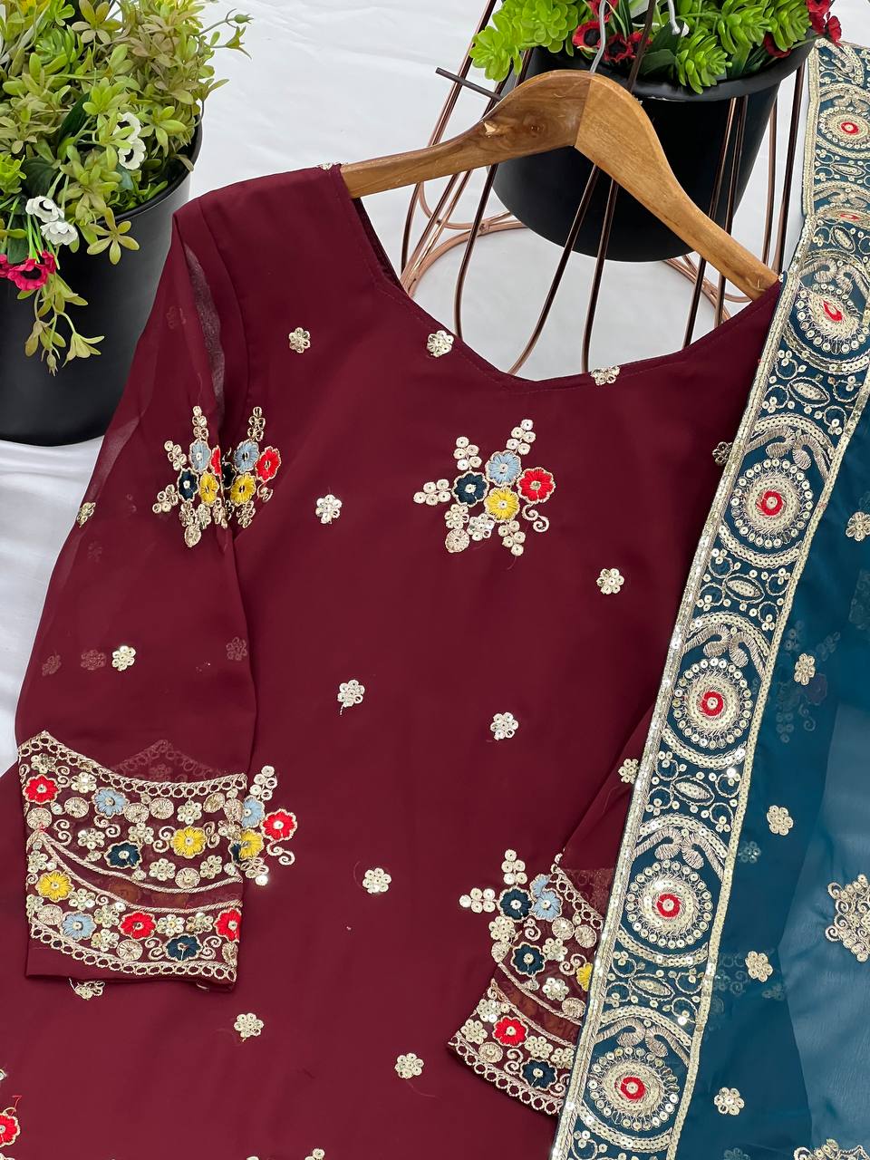 Maroon color georgette sharara suit with dupatta images
