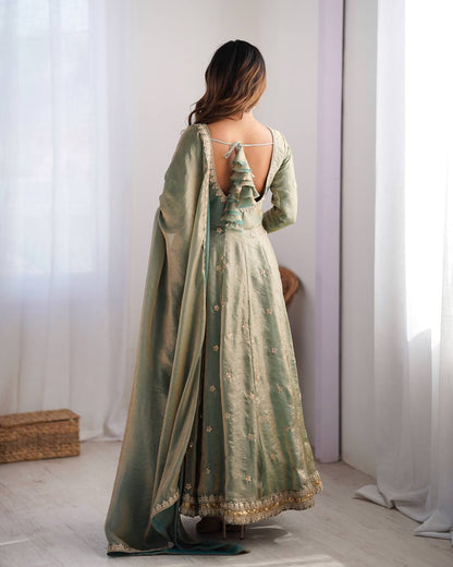 Green color fandy silk gown with dupatta images